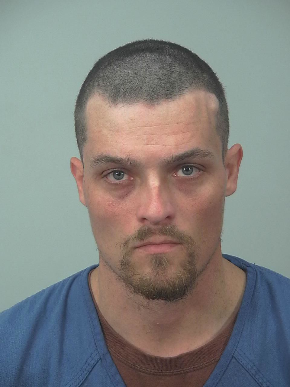 Bank robbery suspect caught blocks from police station, Madison police say